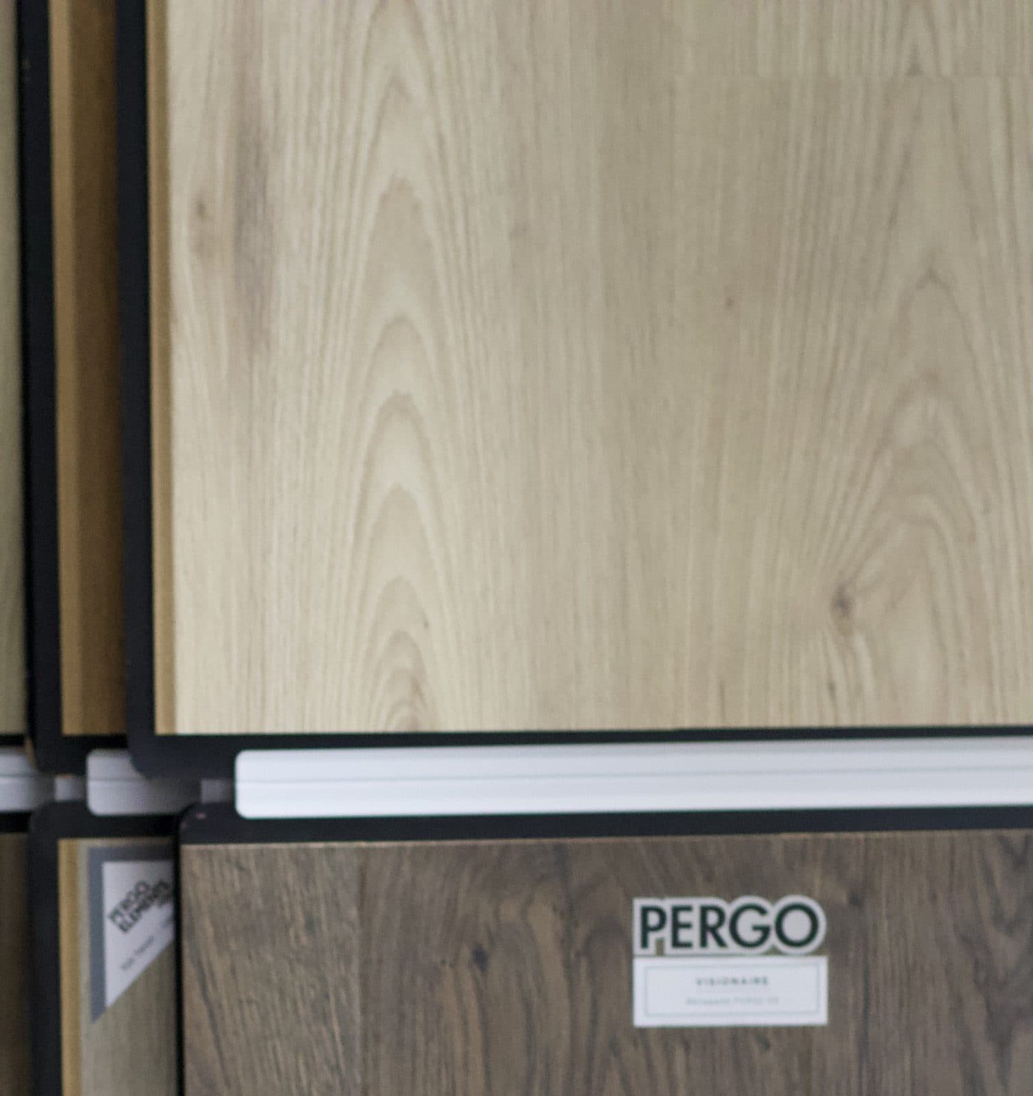 Close-up of Pergo plank samples in the Mr. Wright Flooring showroom