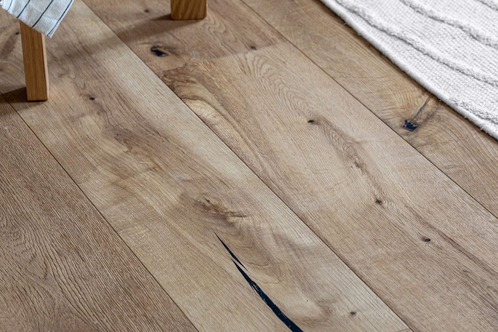 Close view of a wood-look floor in a finished room